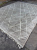 Vintage Moroccan natural  grey background woven rug with white geometric pattern 